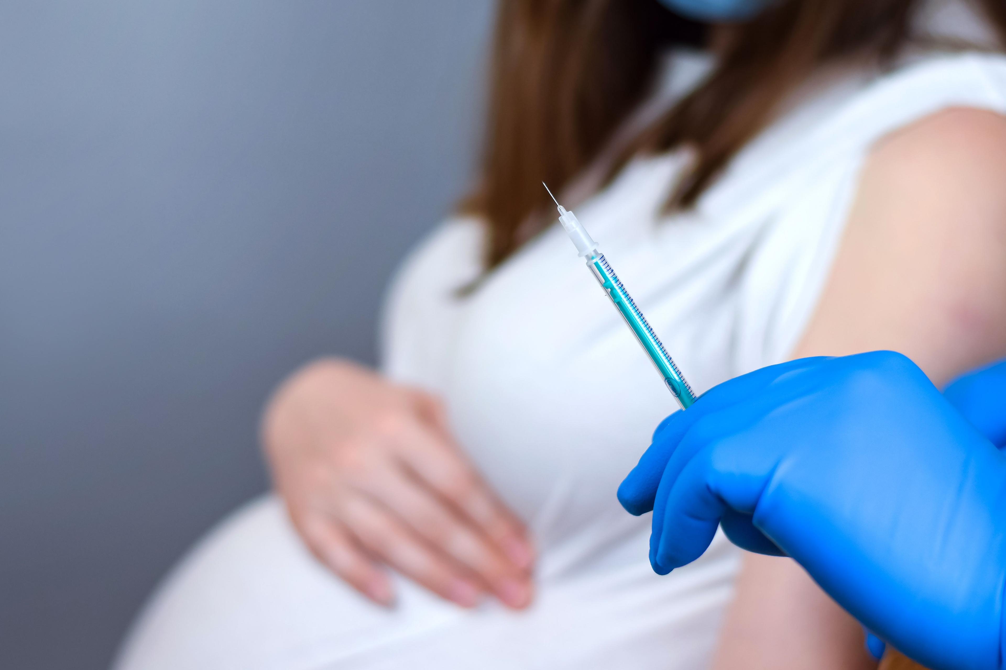 pregnant woman receiving vaccine